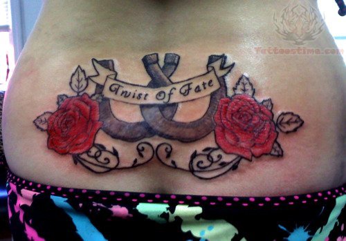 Horse Shoes And Flowers Lower Back Tattoo